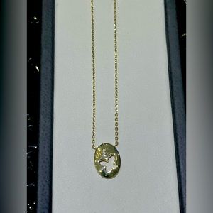 Adorable 14k gold necklace with diamond accent.